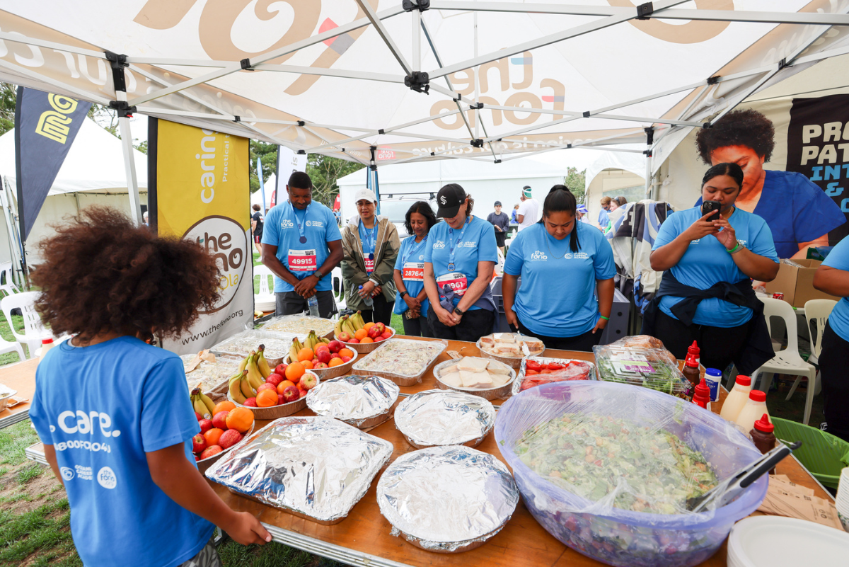 Blessing food at The Fono's tent at Round the Bays 2024