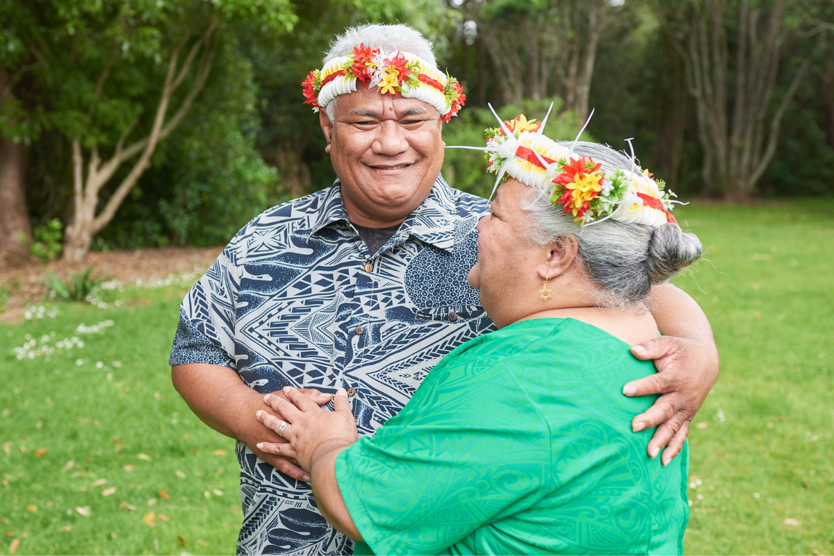 Older Pacific man in park with his wife