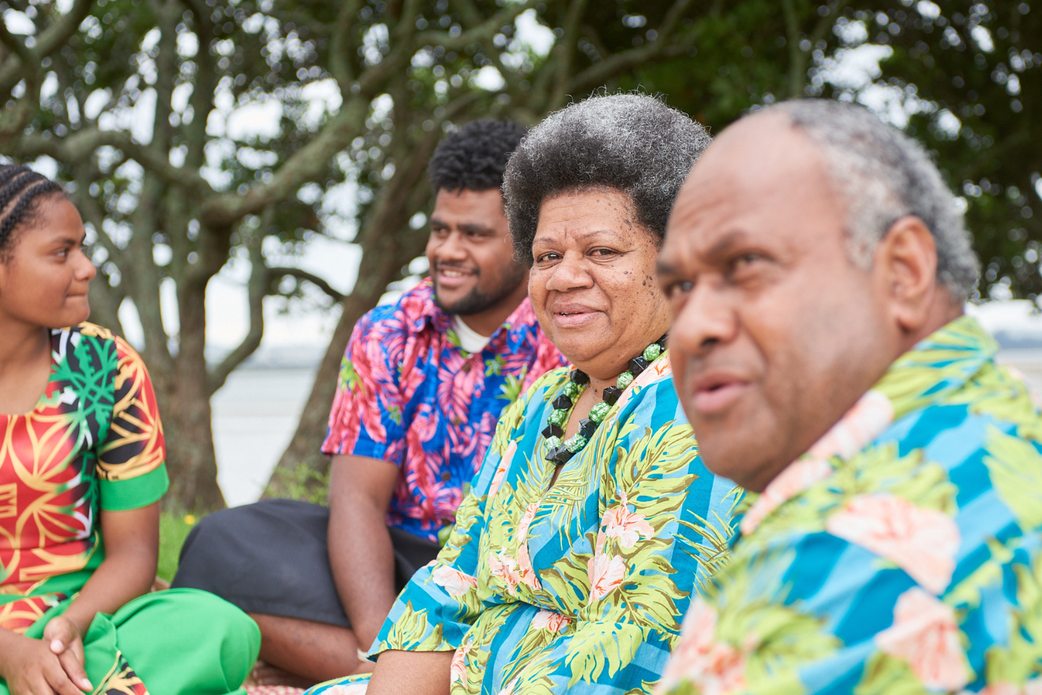 Fijian family different ages in park 